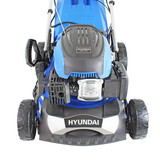 Adjustable cutting heights mower